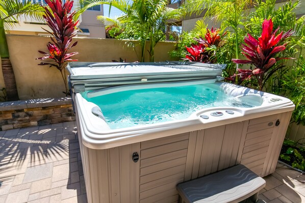 6 person hot tub and mature landscaping for privacy!