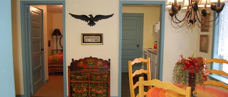 View into the BR and kitchen from the dining area