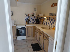 From lounge into the kitchen
