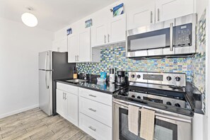 The fully equipped kitchen is perfect for your culinary needs!