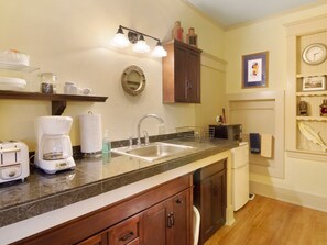 Kitchenette (toaster available upon request) 
**Kitchenette means mini fridge, microwave, coffee maker, plates, cups.**