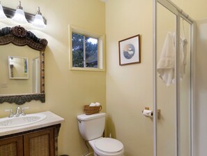 Bathroom with shower. (Shower has been remodeled December 2023.)