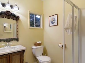 Bathroom with shower. (Shower has been remodeled December 2023.)