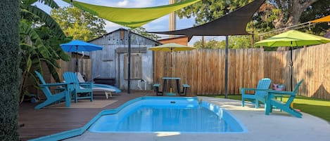 Pool and backyard oasis with a view of the Tower.