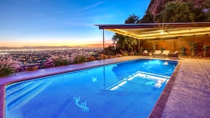 Sparkling pool looking out at mountain & city views w/ spa & poolside gazebo