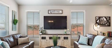 Family room featuring a large flat screen tv