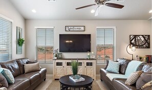 Family room featuring a large flat screen tv