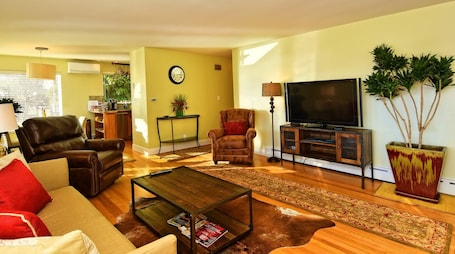 Open Living Room Which Leads To The Dining Area With Gourmet Kitchen Attached