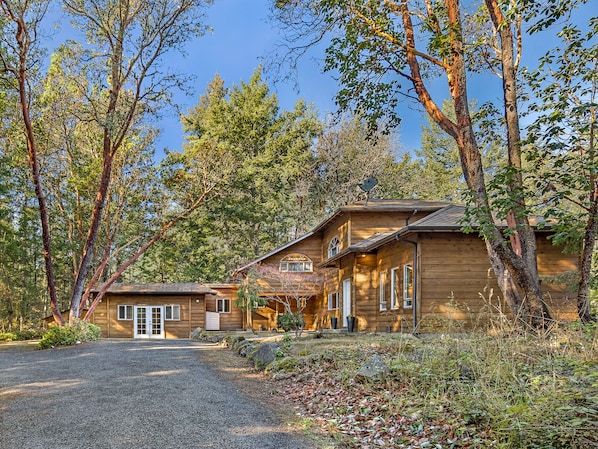 Woodhaven is surrounded by madrona trees.