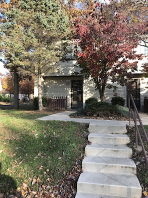 Front of unit 63; stairs from parking into unit