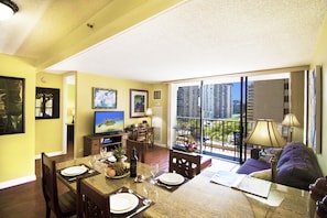 Enjoy and relax in your living room with a pull-out sleeper sofa and a flat-screen TV.