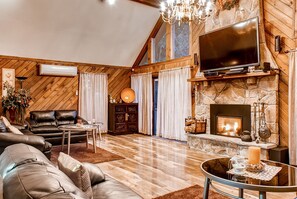 Cozy up next to the gas fireplace and watch your favorite shows.