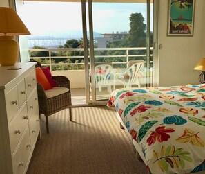 Bedroom with balcony, sea views, with super-king size bed.