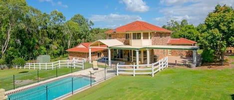 A beautiful home in an acreage estate, half way between Brisbane & Gold Coast.