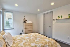 ground level bedroom with access to patio.