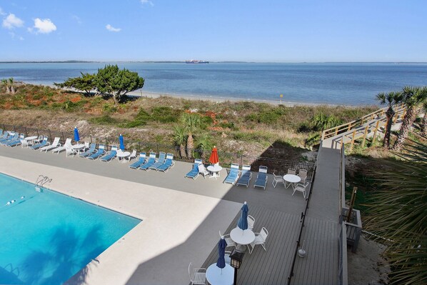 Pool right next to the beach with a private walkway to the beach.