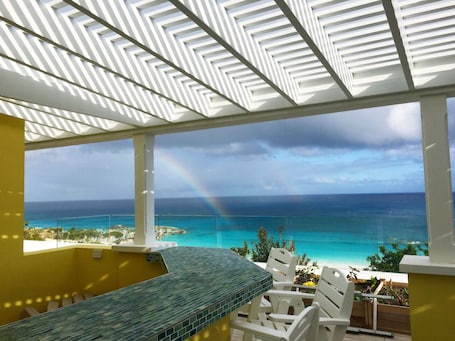 You too may find a rainbow from the comfort of the bar sitting area.