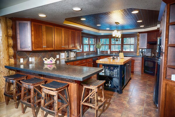 Fully equipped kitchen with heated tile floor