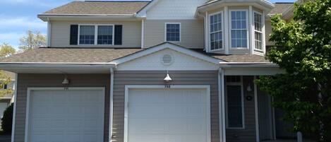 Front of home. Garage is on the right. Living space is located on second floor.