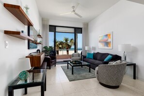 Beachfront living room with a large smart tv and comfortable sea - Beachfront living room with a large smart tv and comfortable seating