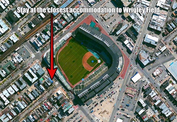 Book the closest Residence to Wrigley Field with best outdoor patio.
