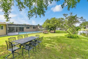Outdoor | Lakefront, seating, screened in pool for the perfect  experience. *Screen no longer there.
