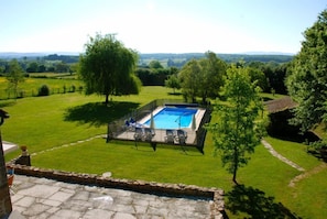 VIEW FROM BEDROOM OVER POOL WITH UNSPOILT FAR REACHING VIEWS