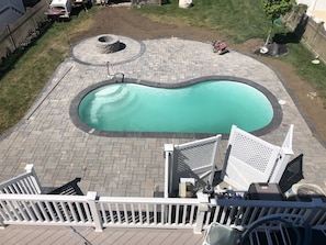 New pool deck and fire pit right after construction was finished.