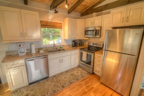 Kitchen with Granite Counters and Stainless Steel Appliances