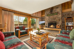 Living Room w/ TV & Fireplace