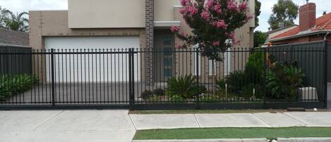 Front Entrance with secure remote sliding gate