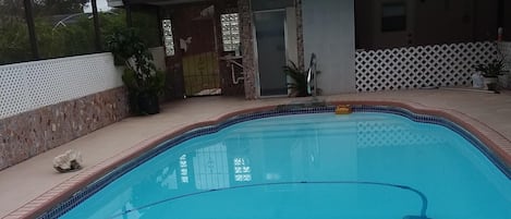 Inside pool with  sink and shower.