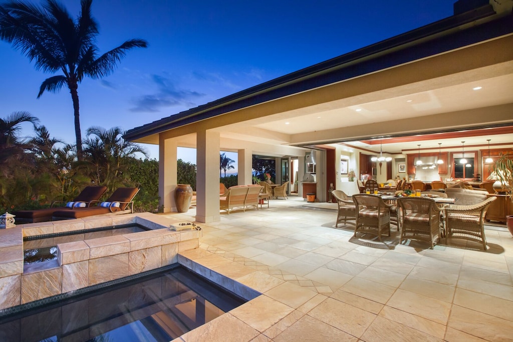 Image of a gorgeous villa in Hawaii with private pool and large outdoor entertaining area.