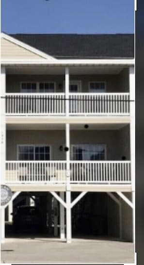 Two covered parking bays
Parking for 3 cars
Two balconies 