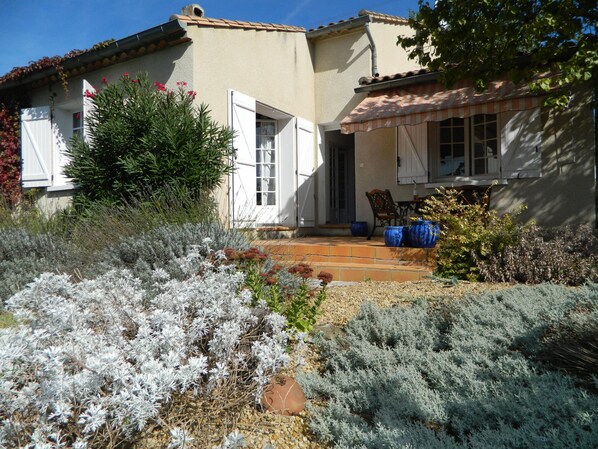 Les Lauriers in a private colourful and aromatic garden.