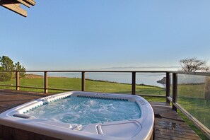 Warm up in the hot tub and watch the sunset.