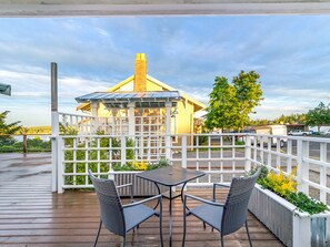 The deck of the Salish room opens to the Cannery shared deck