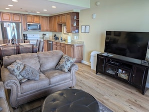 Family room w/55" TV, Blu-ray player and videos
