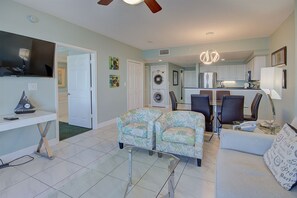 Living room with view to kitchen