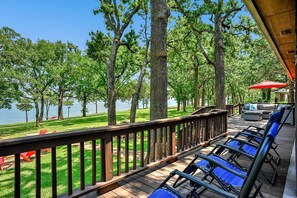 back patio deck with zero gravity chairs, enjoy the 180 degrees waterfront view