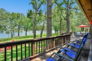 back patio deck with zero gravity chairs, enjoy the 180 degrees waterfront view