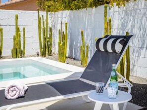 Lounge chairs for relaxing by the pool