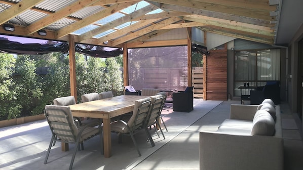 Outdoor HUGE Verandah area. Outdoor Blinds all around. 