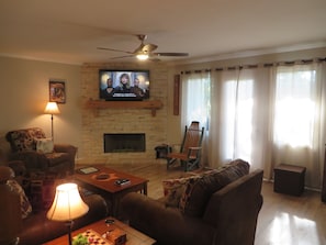 Relaxing living room with smart TV, soundbar, Blu-ray player