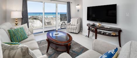 HUGE flat screen in GD 215 for nighttime entertainment - Enjoy the beach and hot Florida sun all day and cozy up in your Gulf front living room for movies at night