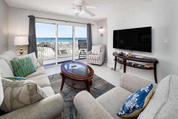 HUGE flat screen in GD 215 for nighttime entertainment - Enjoy the beach and hot Florida sun all day and cozy up in your Gulf front living room for movies at night