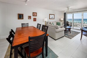 Dining and living room view - The dining room table located next to the kitchen for your convenience