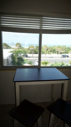 Beach view from Living room window - enjoy  your coffee or watch sunsets 