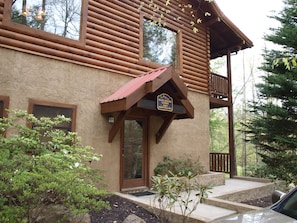 Front Entry to BlueMooseLodge next to 1 0f 2 driveway areas enters lower floor.