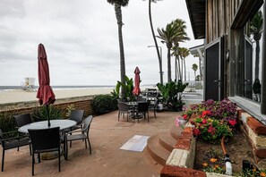 Watch the waves roll in from the spacious  patio! 